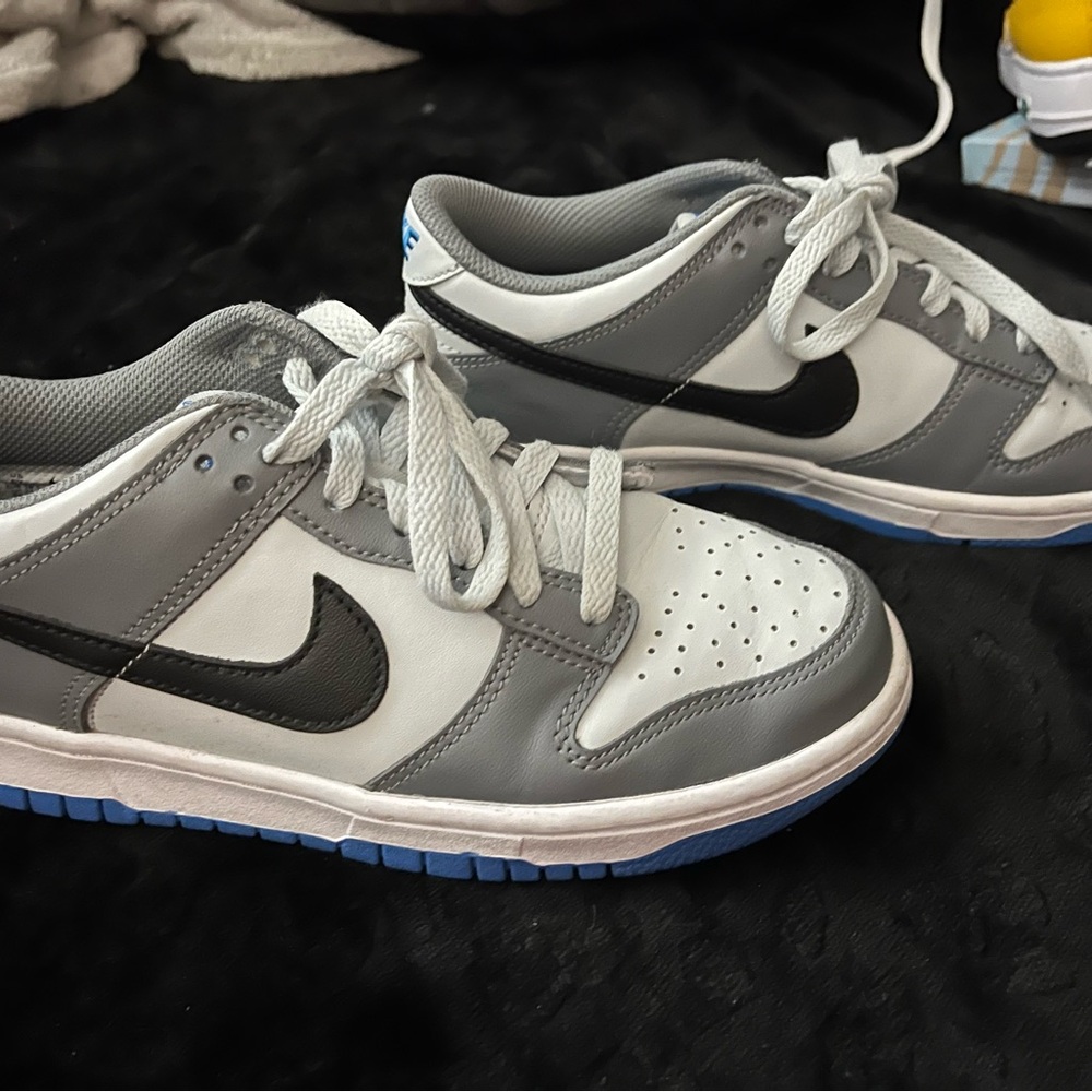 Nike White and Gray Sneakers with Black Swoosh